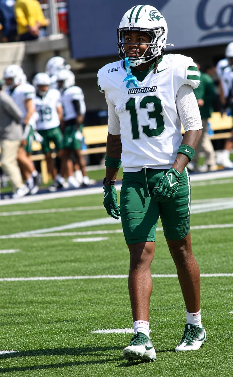 Wagner Seahawks number 13 walking the field during warmups